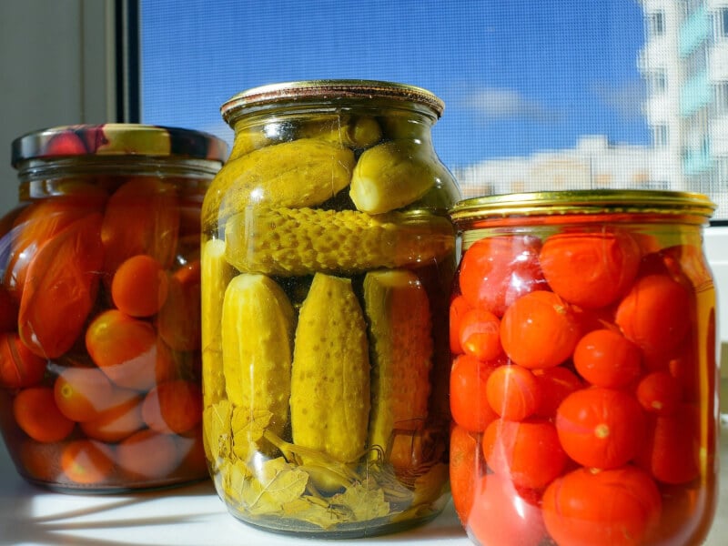 three jars of pickled vegetables 