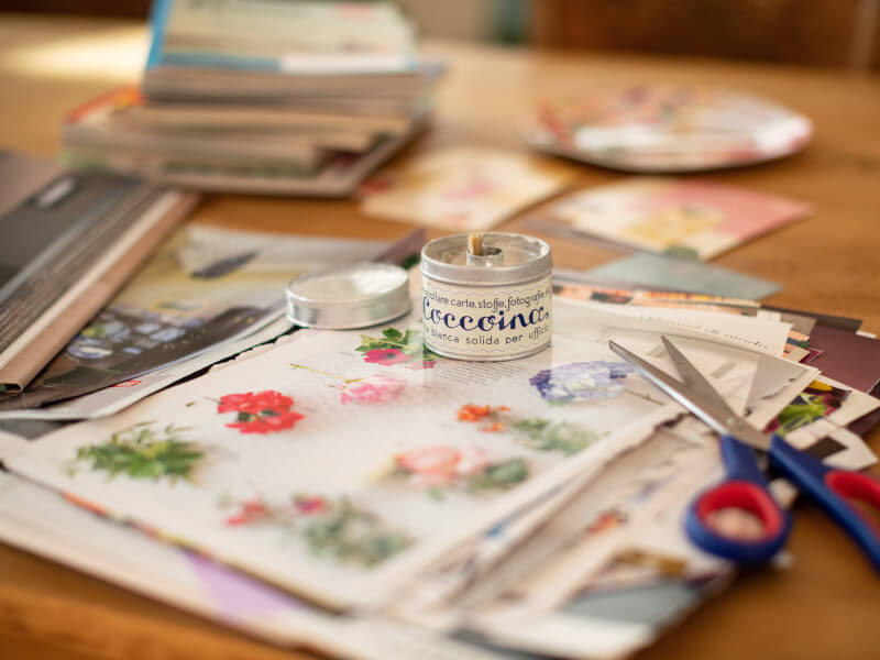 A homemade soy candle in the middle of a desk