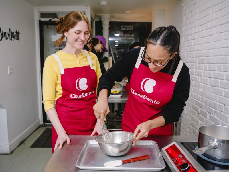 Smiling women in a baking class