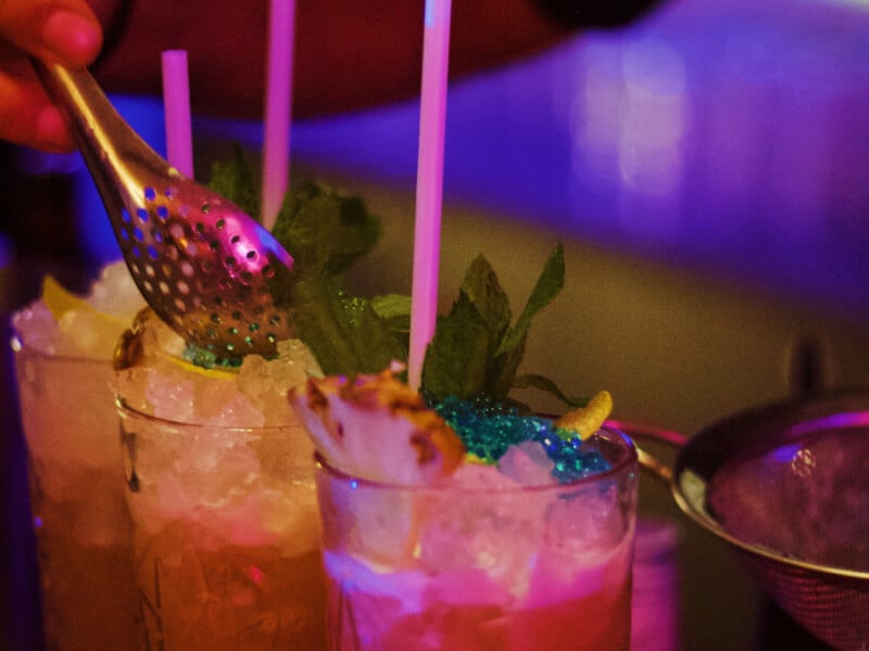 mixing drinks at a cocktail class in manchester