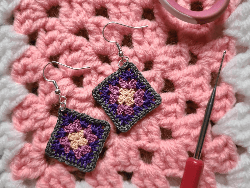 A pair of colourful crochet earrings