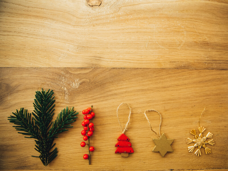 Several christmas themed decorations placed on a table