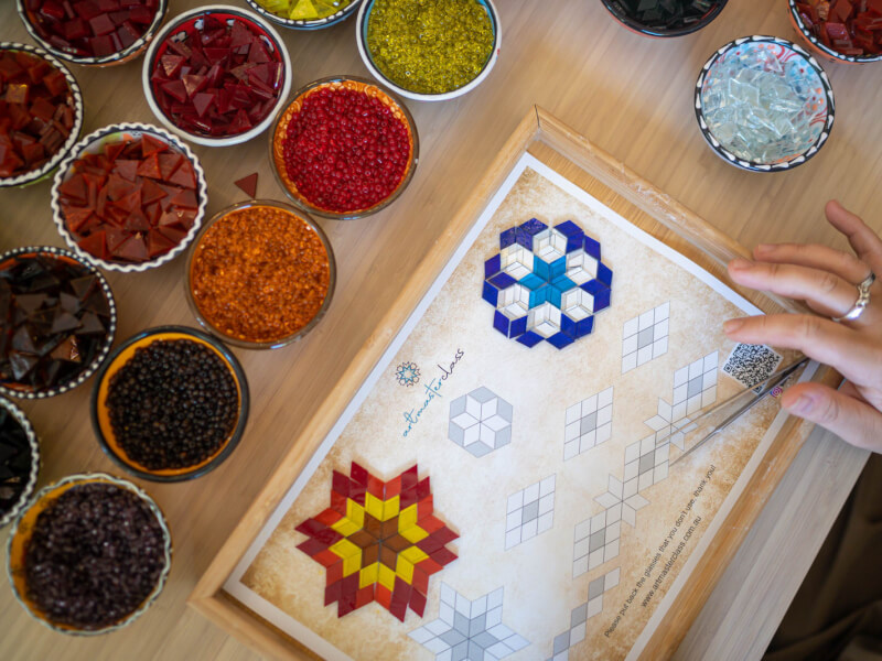 Bowls of tiles and materials for mosaics 