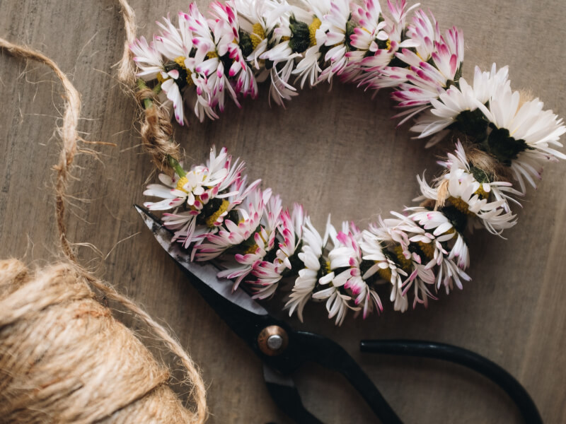 A DIY flower crown in the process of being made