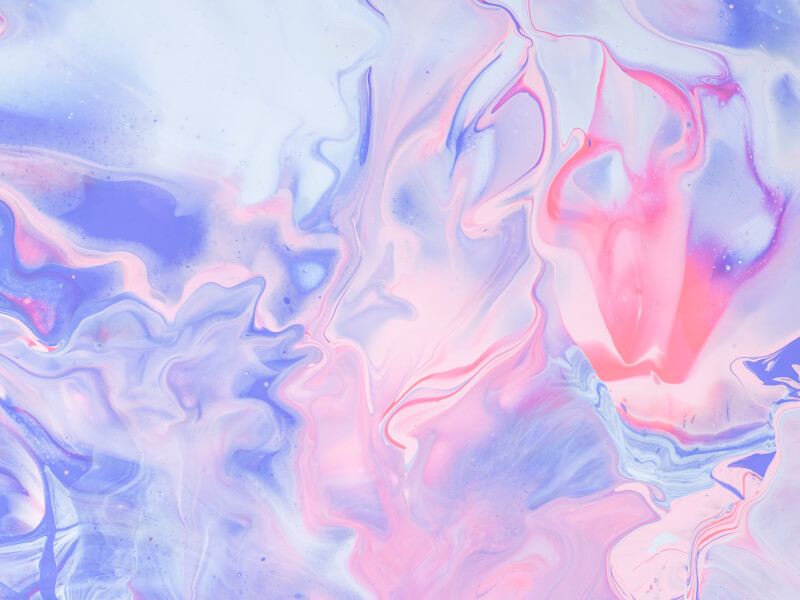 A purple and pink artwork created at a paint pouring class. The piece has swirly patterns and flowing tones.
