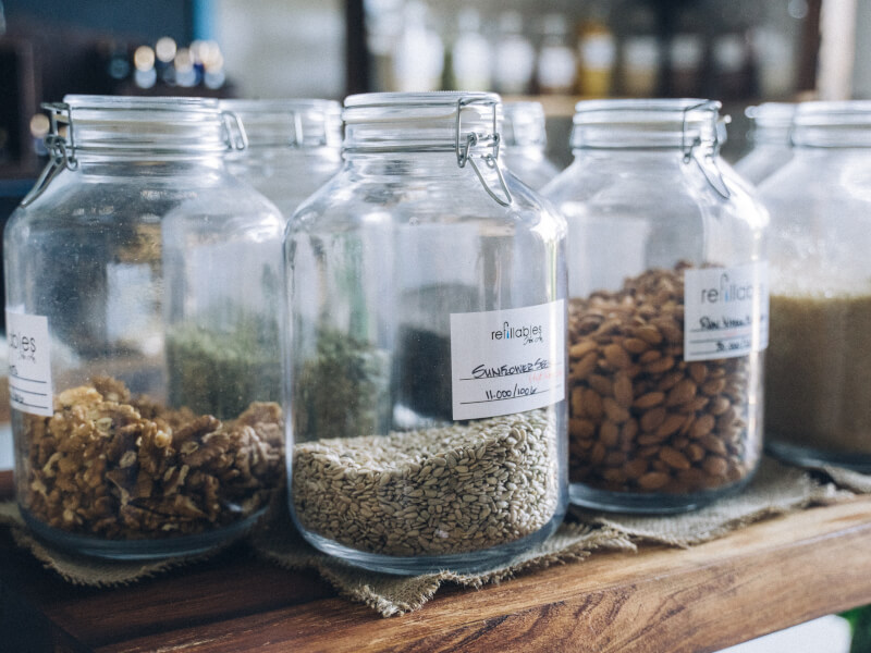 A shot of mason jars full of ingredients.