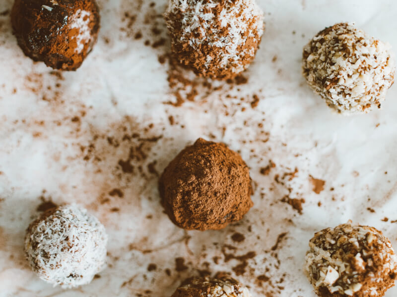 Handmade vegan chocolate truffles coated in coconut. 