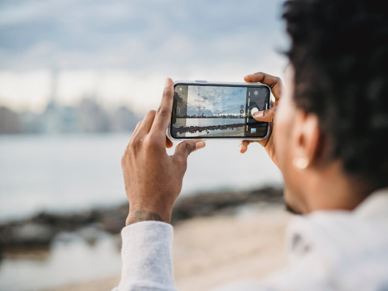 A person learns about smartphone photography.