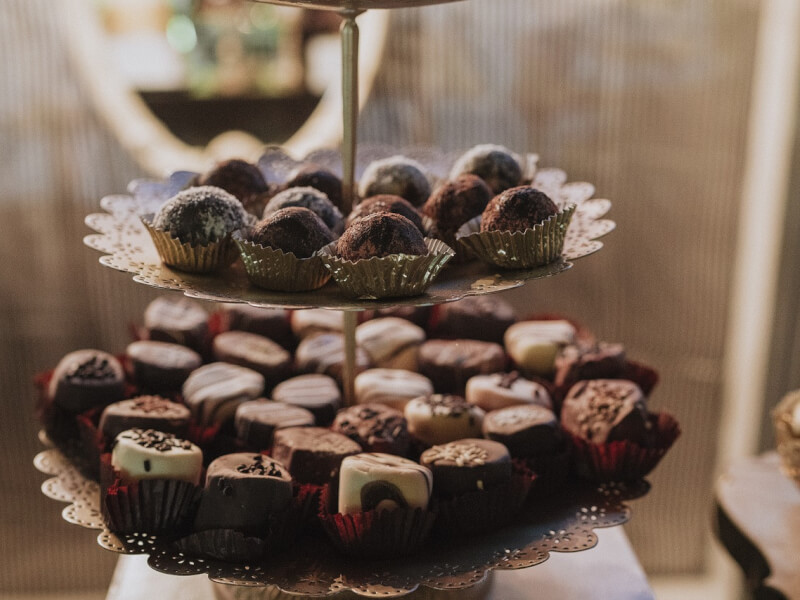 A selection of white and dark chocolate truffles.